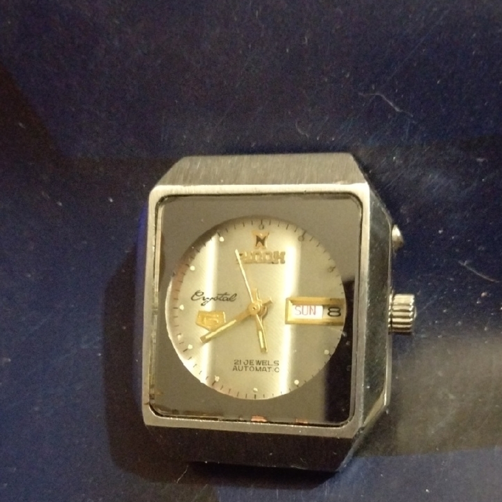Ricoh 1973 Silver and Gold Dial Watch